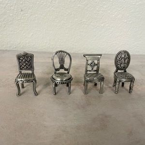 39 Silver chairs-place card holders. 5 sets of 8 4 types of little chairs.